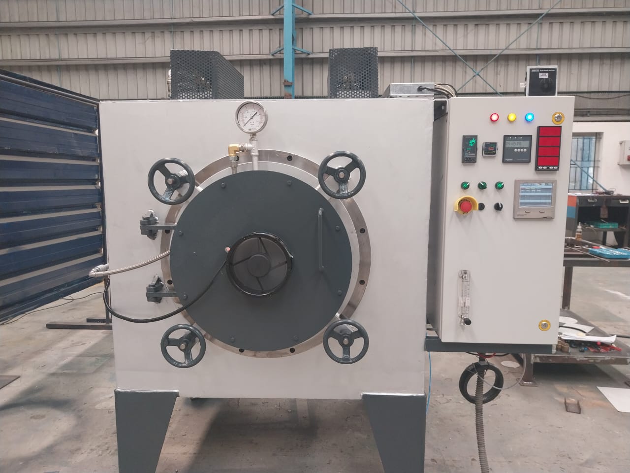 Vacuum oven with door, gauge and control panel built by Lakshmi Vacuum Technologies
